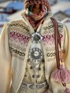 Ingrid tilpasset bunader med blomsterbroderier Bunadstrikk  thumbnail