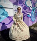 Ingrid tilpasset bunader med blomsterbroderier Bunadstrikk  thumbnail