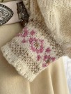 Ingrid tilpasset bunader med blomsterbroderier Bunadstrikk  thumbnail