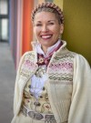 Ingrid tilpasset bunader med blomsterbroderier Bunadstrikk  thumbnail