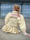 Ingrid tilpasset bunader med blomsterbroderier Bunadstrikk  thumbnail